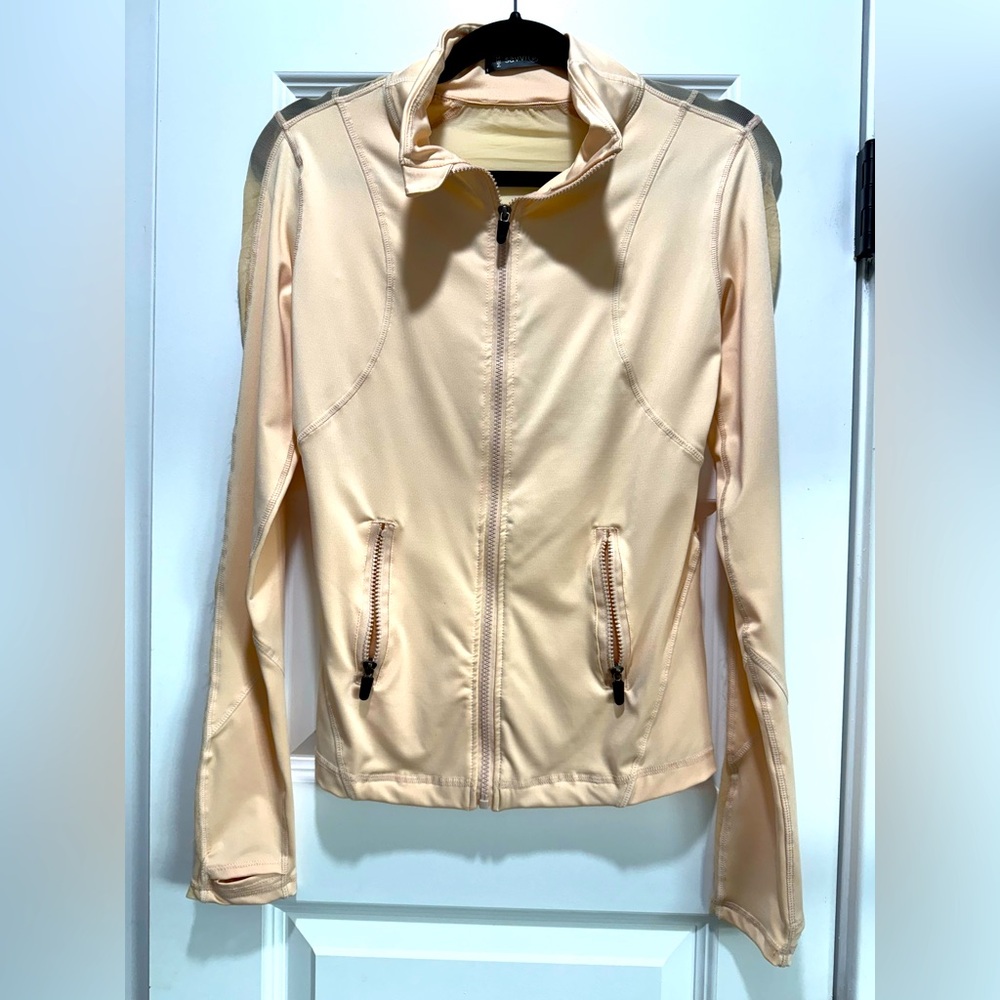 SavviFit size medium peach workout jacket.